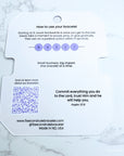 Bracelet packaging with instructions and QR code on a marble surface