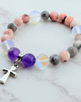 Radiant Silver Cross Charm Bracelet Amethyst