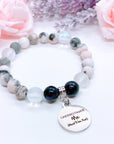 Underestimate Me… Lava Stone & Pink Zebra Jasper Charm Bracelet