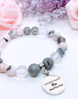 Underestimate Me… Lava Stone & Pink Zebra Jasper Charm Bracelet