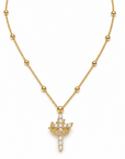 A gold beaded chain necklace with a crown-shaped pendant paved with clear crystals, displayed on a clean white background.