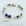 Beaded bracelet with a 'Daughter' charm on a marble surface