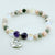 Beaded bracelet with a heart-shaped 'Daughter In Law' charm on a light background