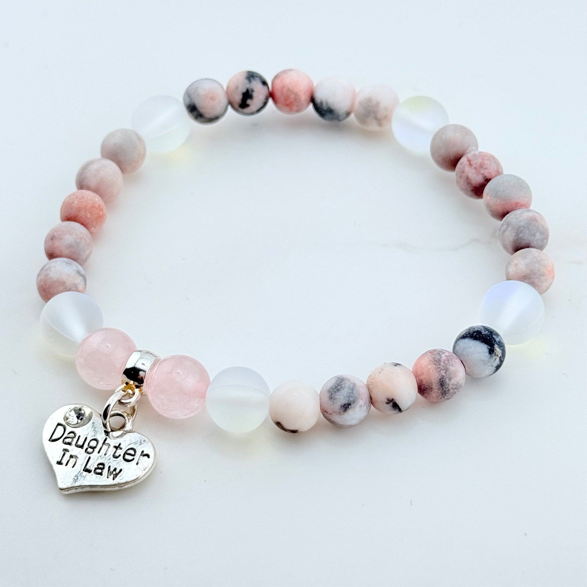 Beaded bracelet with 'Daughter In Law' charm on a white background