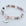 Beaded bracelet with a 'Grandma' charm on a light background