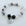 Bracelet with beads and a heart-shaped charm on a white background
