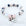Beaded bracelet with heart-shaped charm on a white background