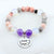 Beaded bracelet with a 'Husband always in my heart' charm on a white background