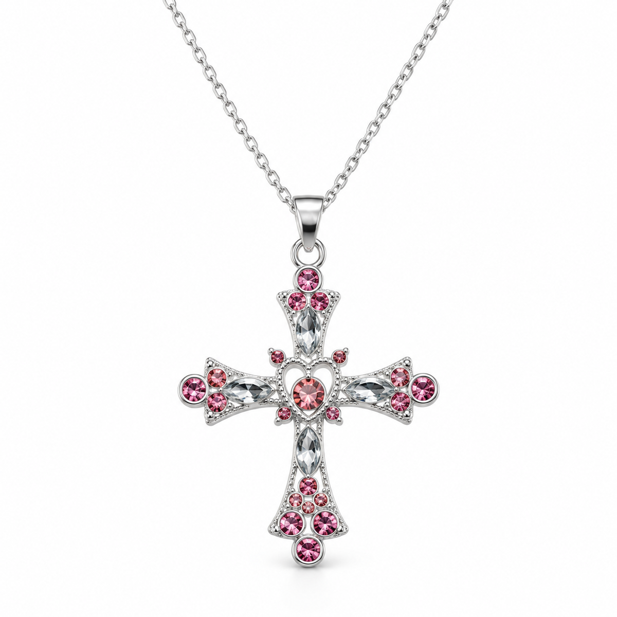 A silver cross pendant necklace adorned with sparkling clear crystals and small pink gemstones, suspended from a silver chain against a plain white background.