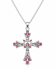 A silver cross pendant necklace adorned with sparkling clear crystals and small pink gemstones, suspended from a silver chain against a plain white background.