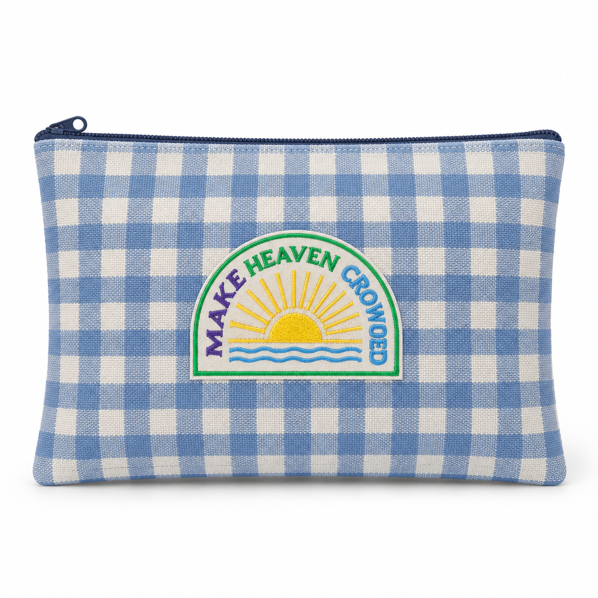 A blue and white gingham pouch with a navy zipper and a central embroidered patch featuring a yellow sun, green border, and the words 'MAKE HEAVEN CROWDED'.