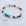 Multicolored beaded bracelet with a 'Mom' charm on a light background