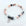 Beaded bracelet with a heart-shaped charm on a white background