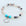 Beaded bracelet with a heart-shaped 'Sister in Law' charm on a light background